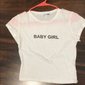 white crop top from Fashion Nova with “BABY Girl”
